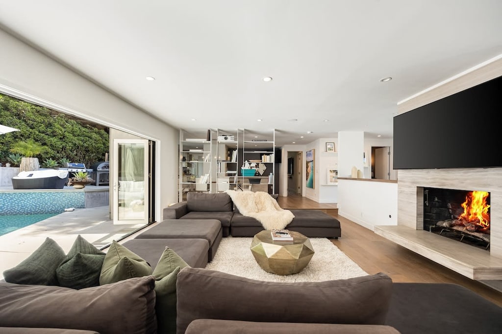 Adorned with an elegant marble fireplace.