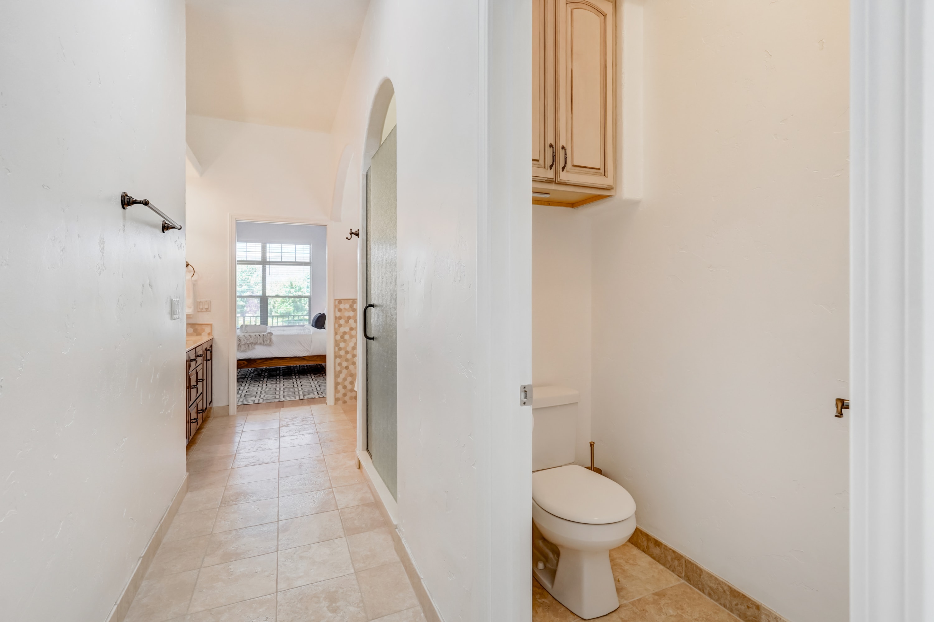 Luxurious master bathroom with a soaking tub, dual sinks, and a spacious walk-in shower.