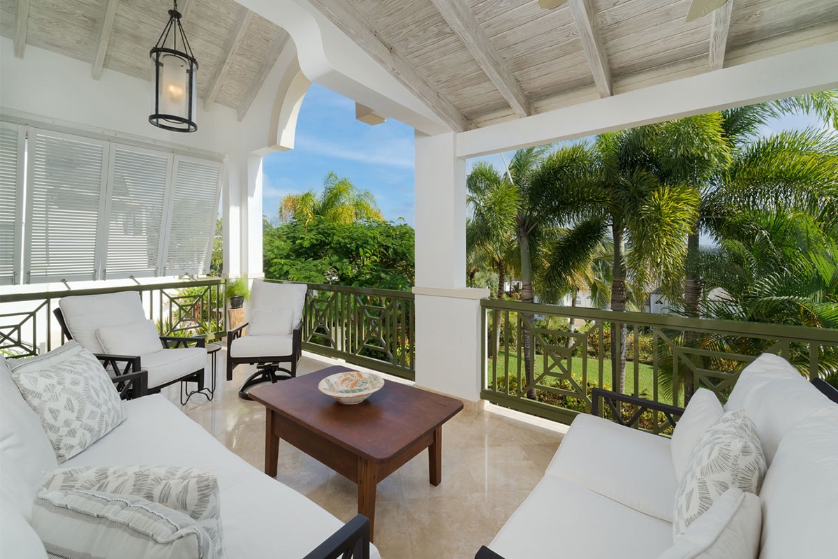 Comfortable lounge area overlooking pool