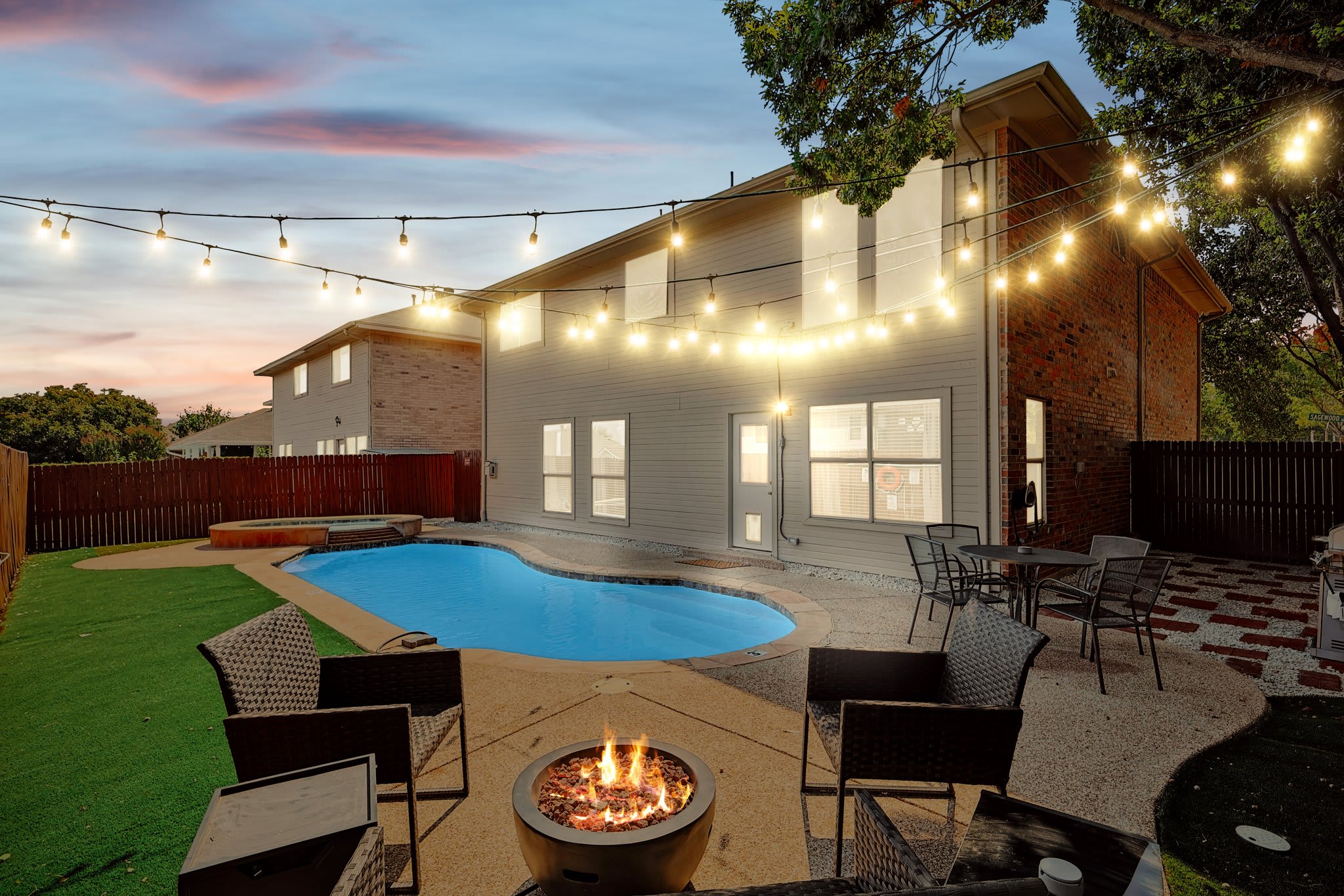 Whether you’re here to enjoy some fun in the pool, enjoy an outdoor meal from the BBQ grill, or chat late into the evening around the fire pit, this backyard has it all!