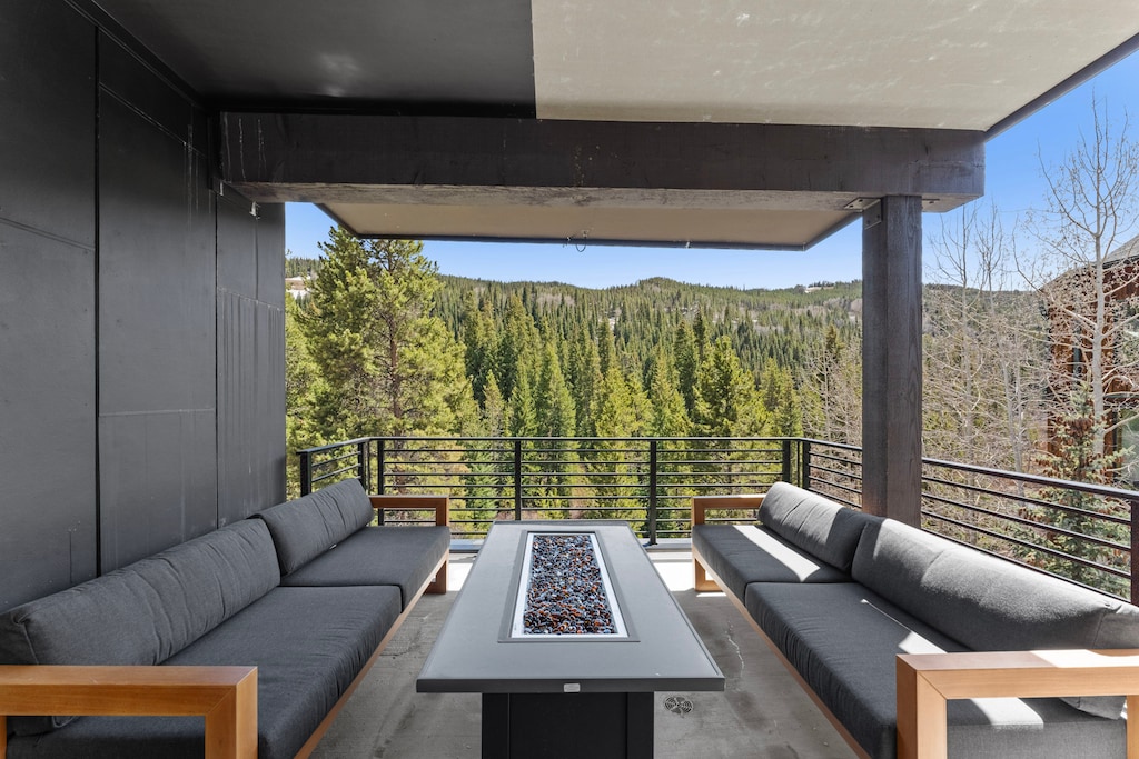 Private balcony with outdoor seating. 