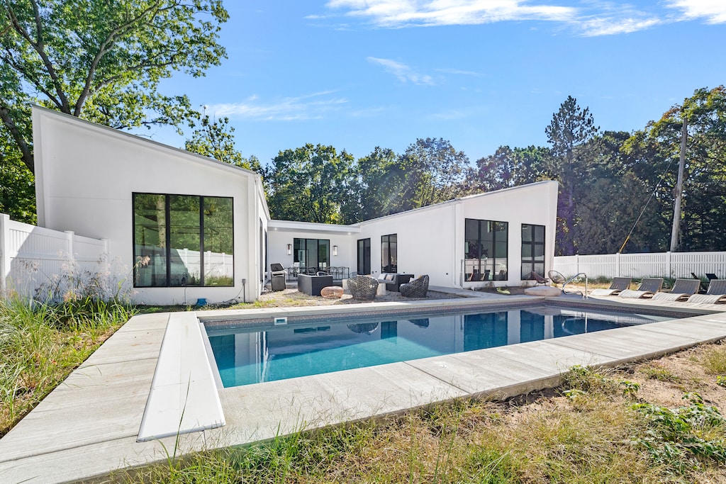 Architectural beauty meets poolside bliss. Ready to dive into relaxation?