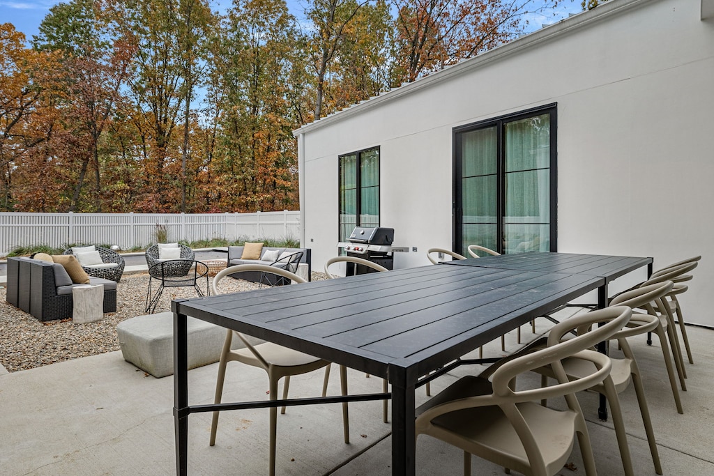 Dine under the open sky, then gather around the fire — patio perfection!