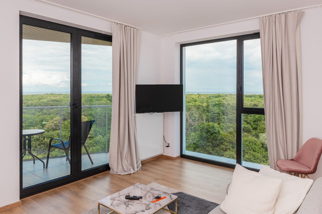 Living room with comfortable sofa, where the guests can relax.