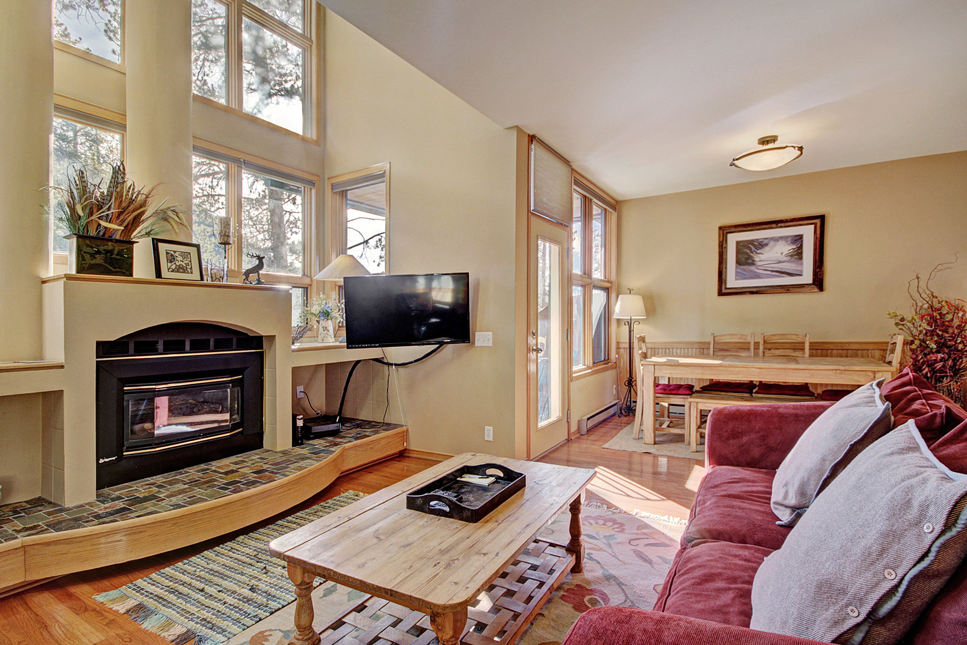 Cozy up next to the gas fireplace as you watch a movie on the flat-screen TV. 