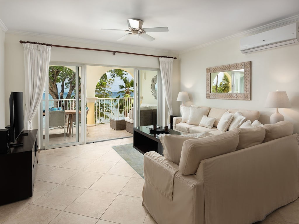 Attractively furnished contemporary beachfront condo