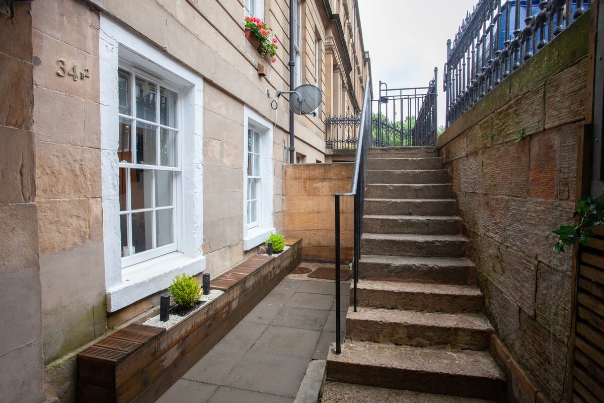 Descend this fantastic staircase to your perfect home from home! You will have this area all to yourself!