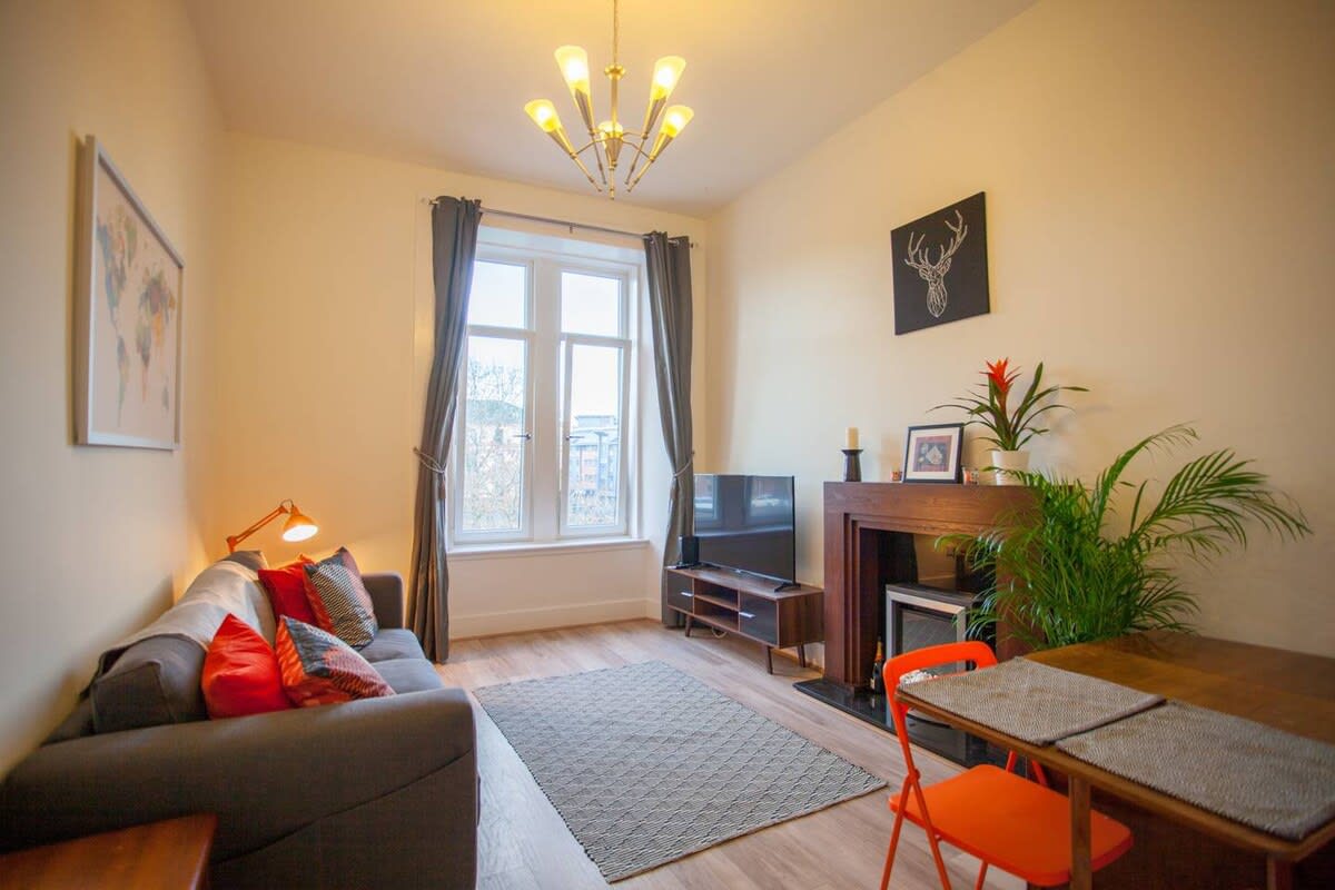 Cosy living room is the perfect place to curl up with friends and family after a long day exploring the city