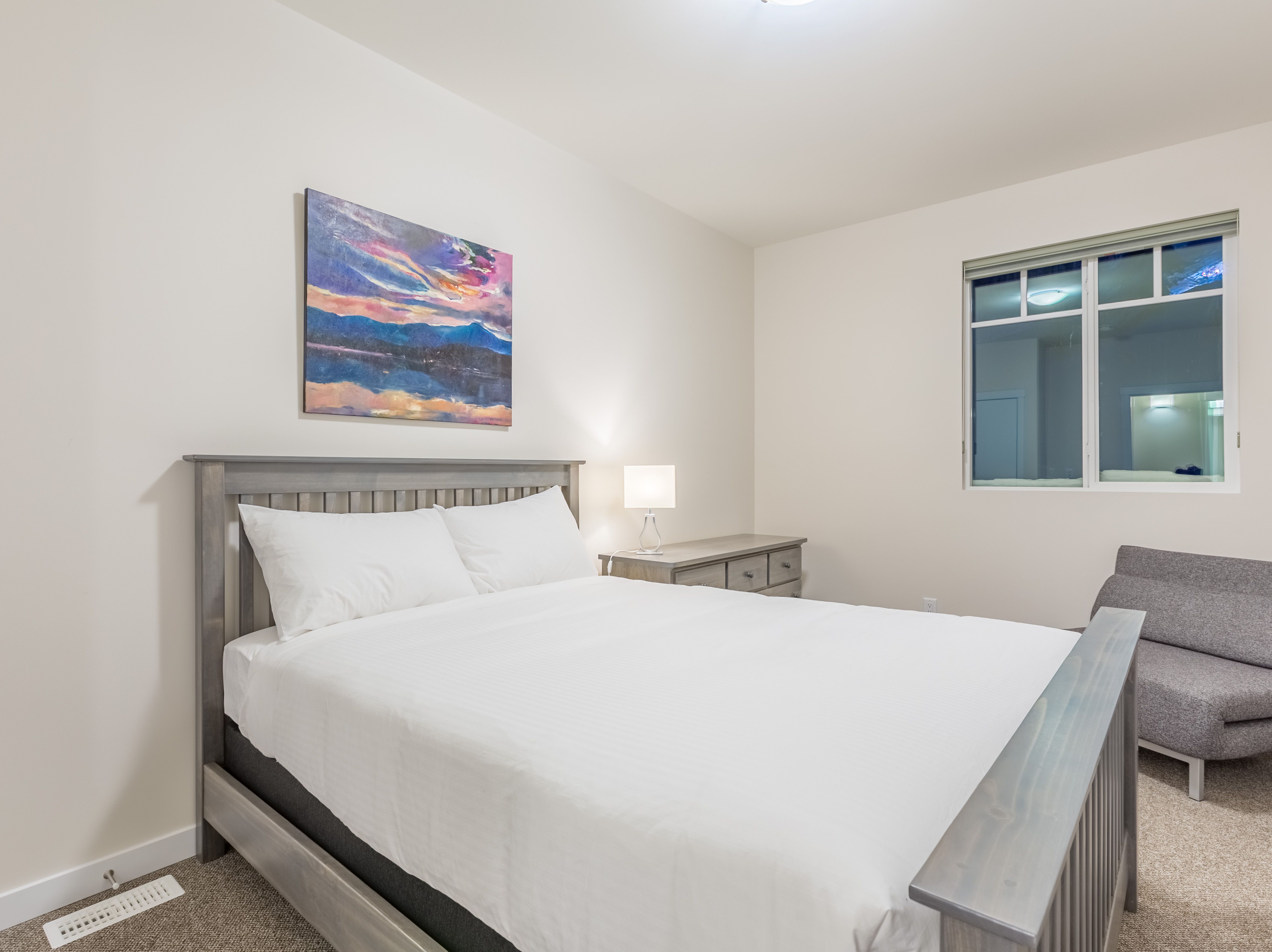 Featuring a queen sized bed.