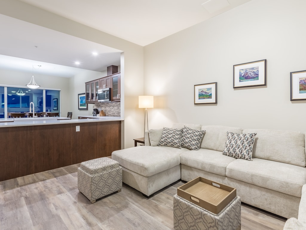 Features a cozy fireplace to the left of the living room area.