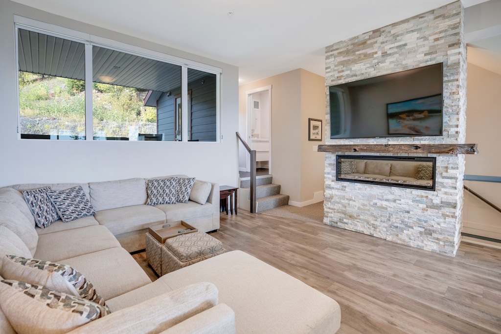 Stairs lead to the entrance to the hot tub + patio area.