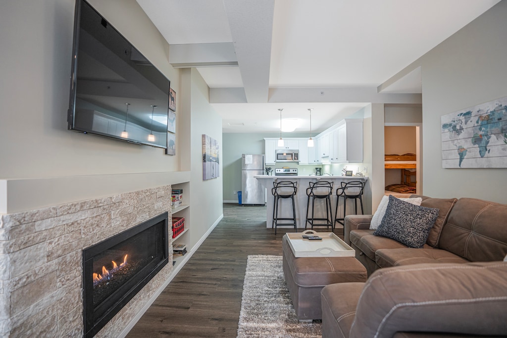 Features a cozy gas fireplace.