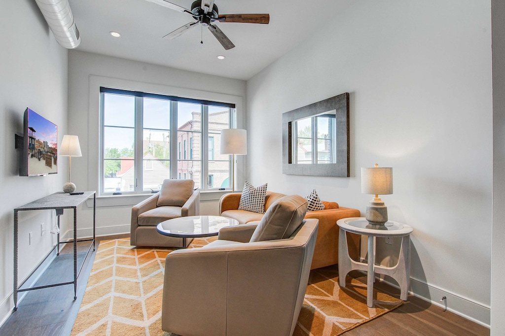 Professionally designed living room space with a Smart TV! Please note there is no balcony but plenty of shared outdoor seating space. 