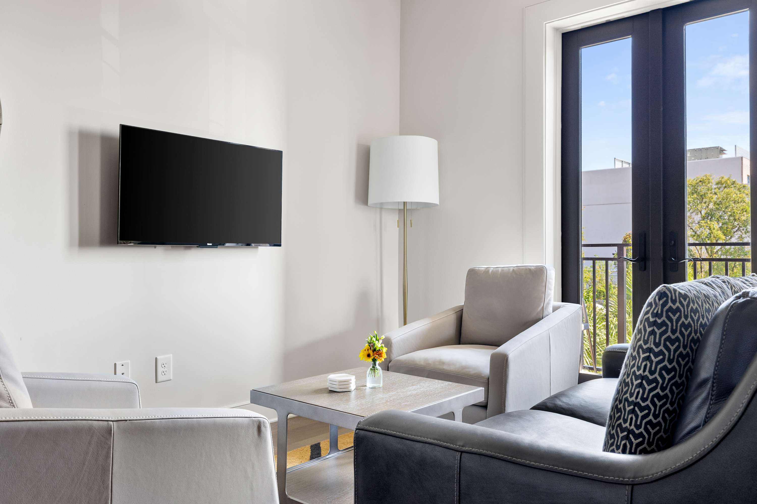 Professionally designed living room space with a Smart TV! 