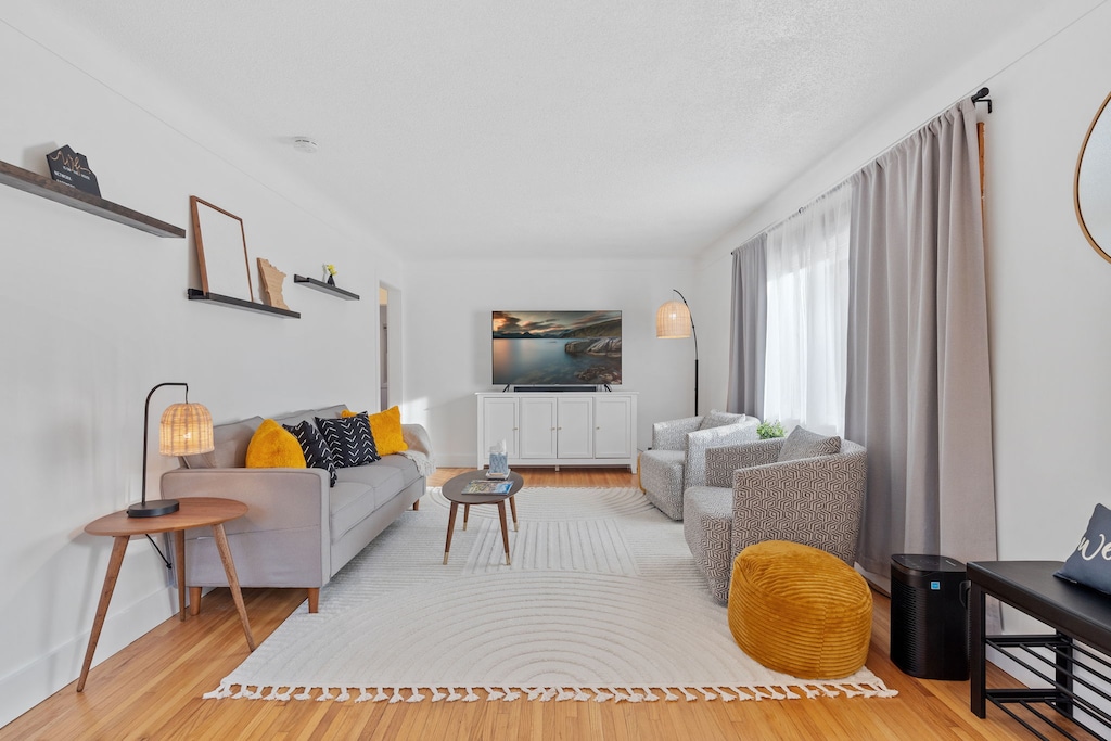 Relax in your stylish living space with plush seating, warm lighting, and modern touches that make you feel instantly at home.