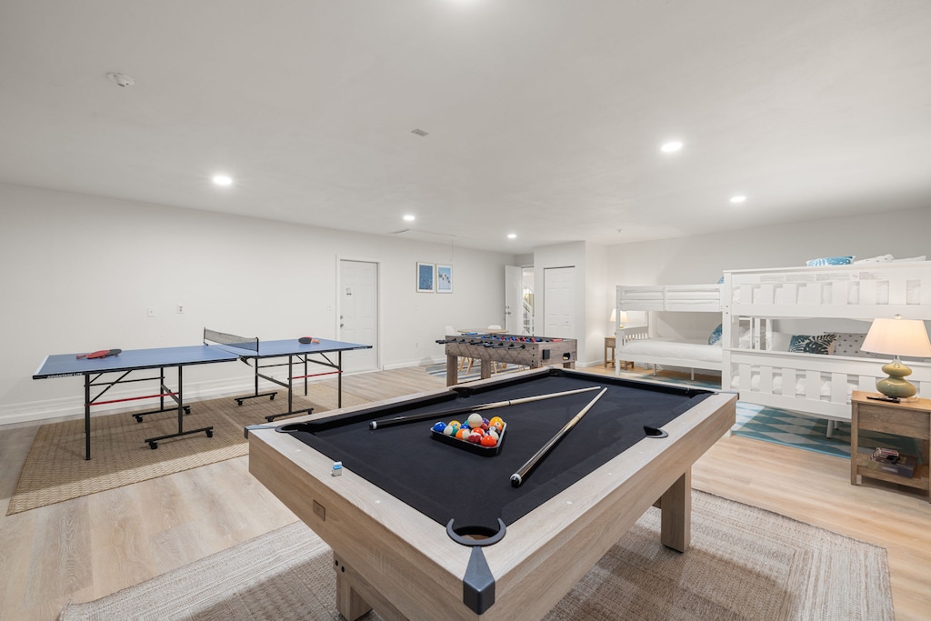 Our bedroom game area has it all! Pool and ping pong table, together with foosball!