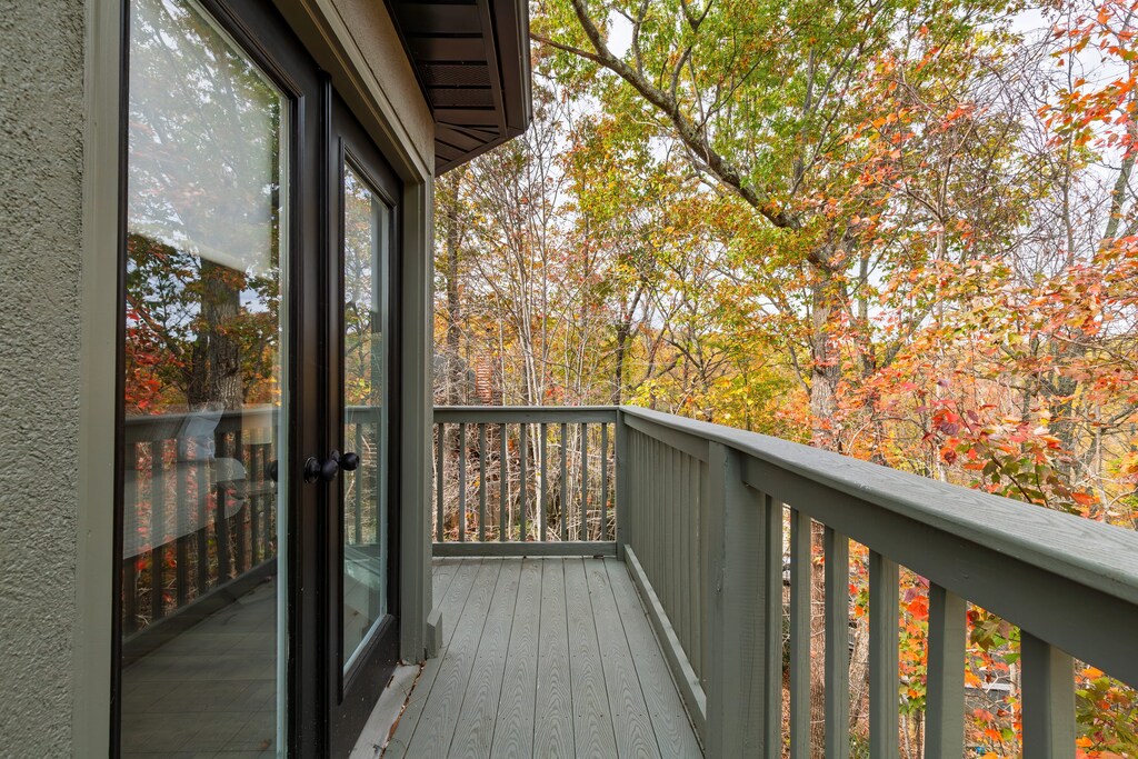 Balcony with forest views.