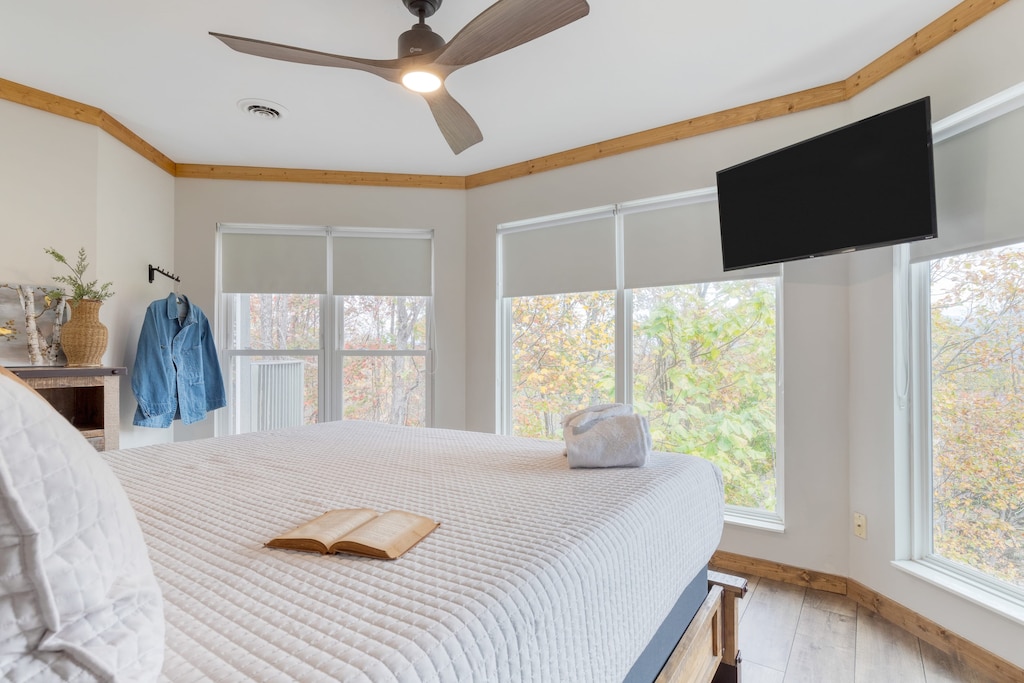Bedroom 3 features a king bed and TV.