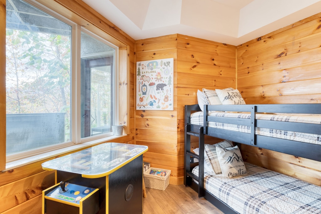 Bedroom 9 features a bunk bed and TV.
