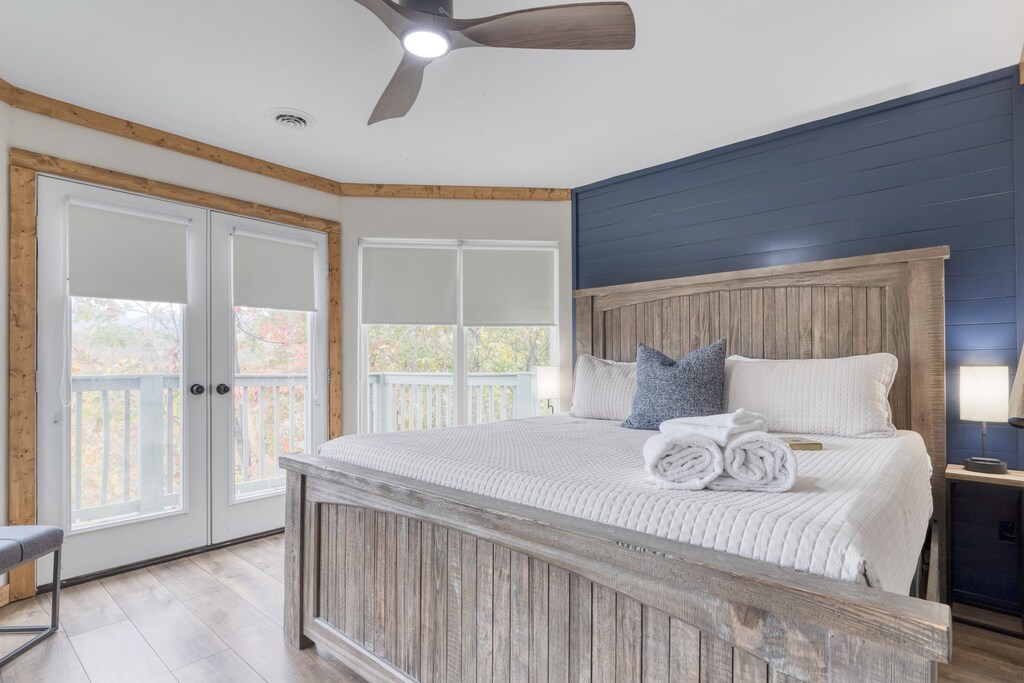 Bedroom 2 features a king bed and TV.