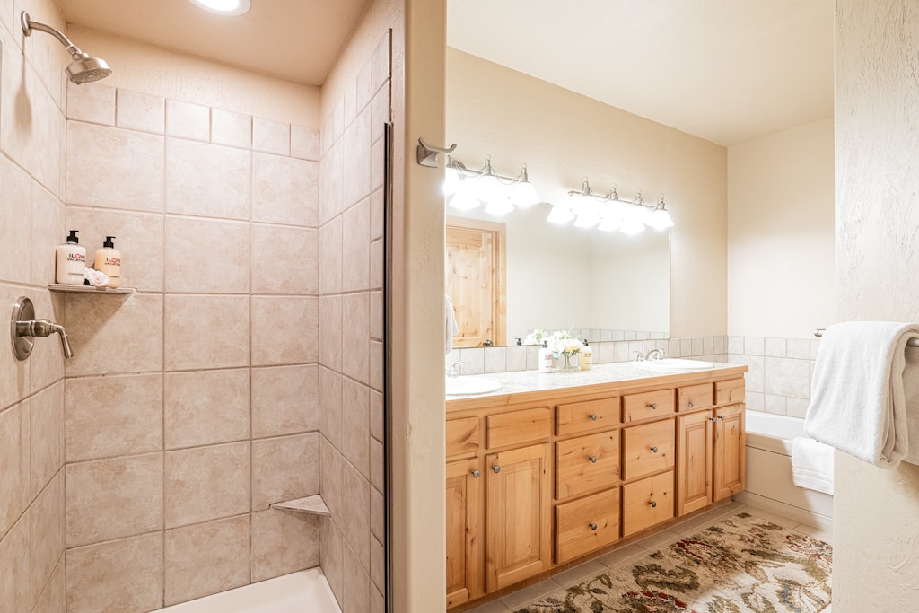 Master Bedroom 1 En Suite Bathroom with stone tiled shower