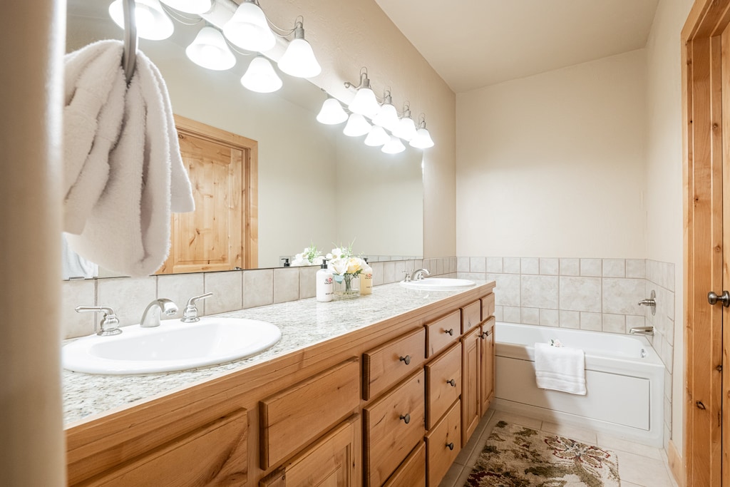 Double sink vanity, and jetted tub