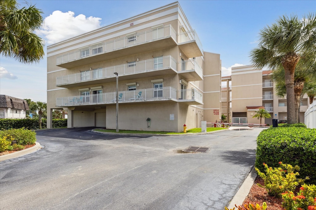 Arrive at the Pier Resort, where palm trees and elegant architecture welcome you to a stay filled with comfort and relaxation.