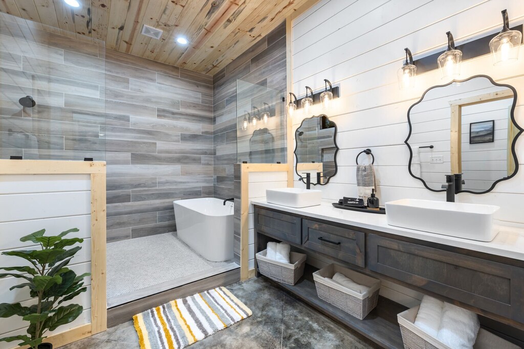 Bathroom across the hallway from king bed downstairs