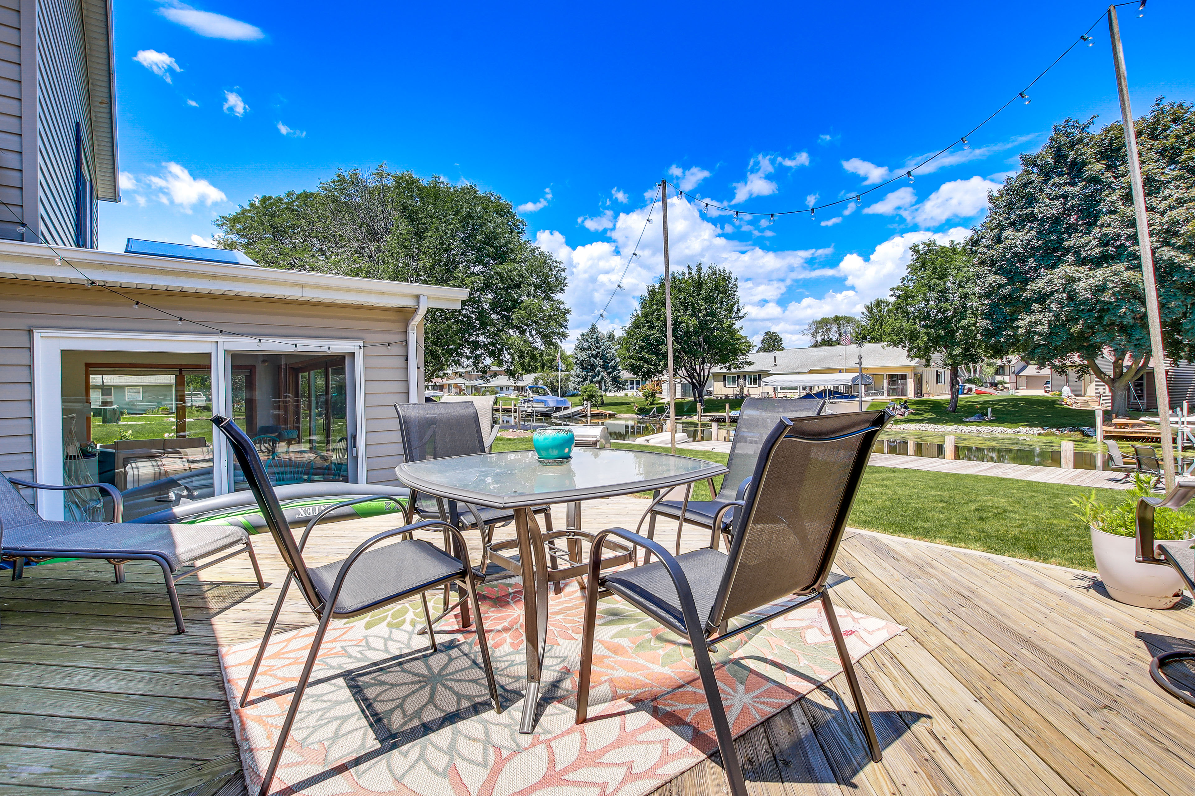 Property Image 2 - Oshkosh Canal-Front Home w/ Sunroom & Watercraft!