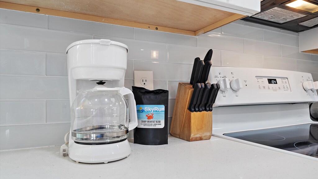 Drip coffee maker with grounded arabica coffee beans and knife block