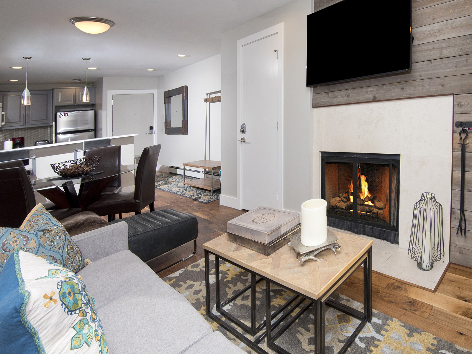 Living Room w/ 55 Inch TV & Wood Burning Fireplace