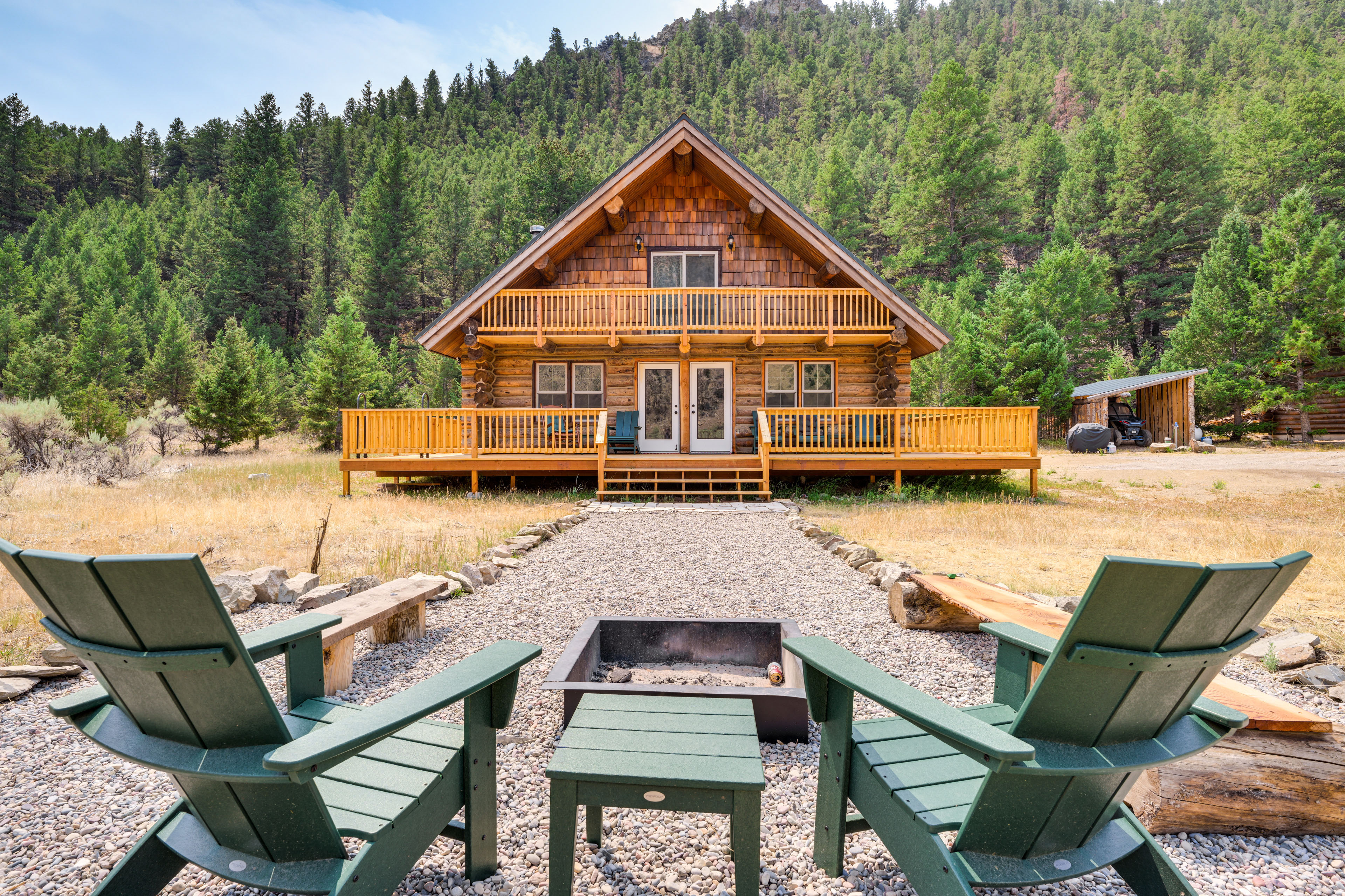 Property Image 1 - Riverfront Montana Log Cabin w/ Mountain Views!