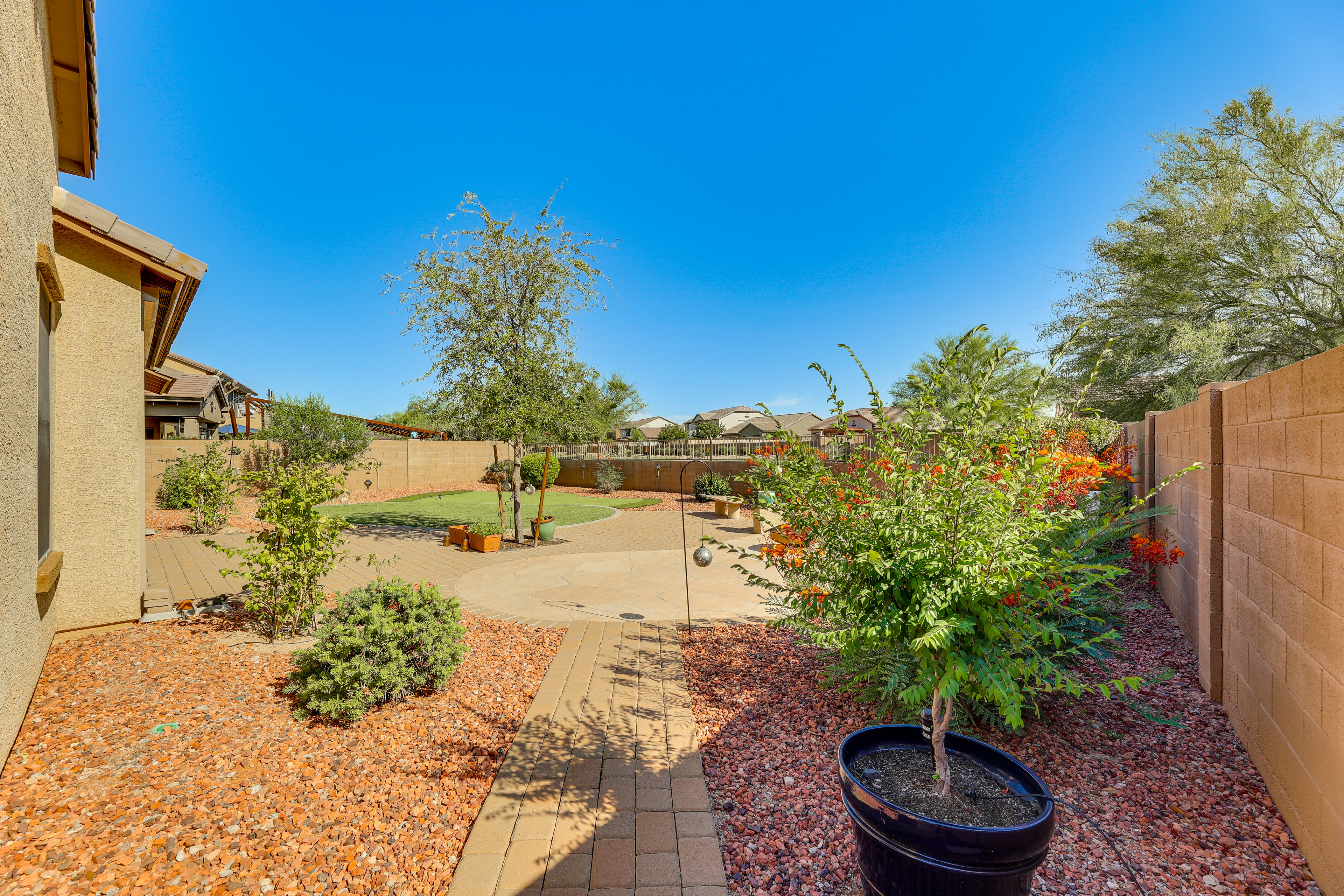 Property Image 2 - Stylish Goodyear Home w/ Putting Green!