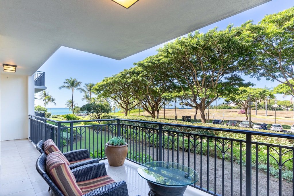 Enjoy tranquil mornings or sunsets on your private lanai with island views.