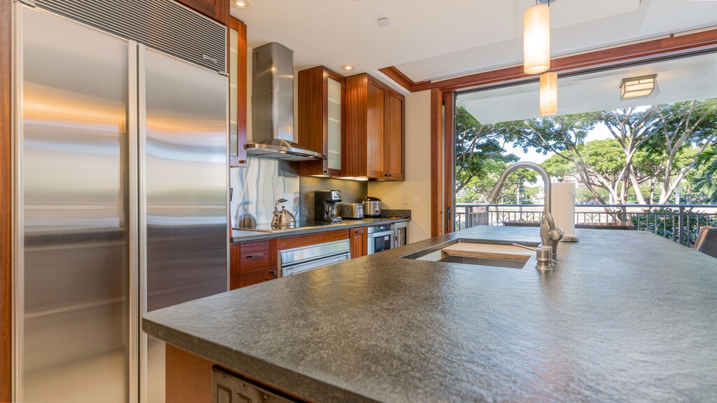 Cook in style with Roy Yamaguchi-designed gourmet kitchen and luxury appliances.