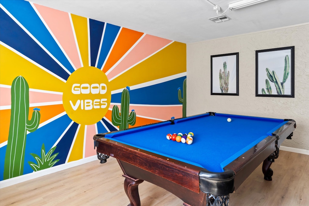 A bedroom with a twist – unwind, play, and stay entertained with your very own pool table!