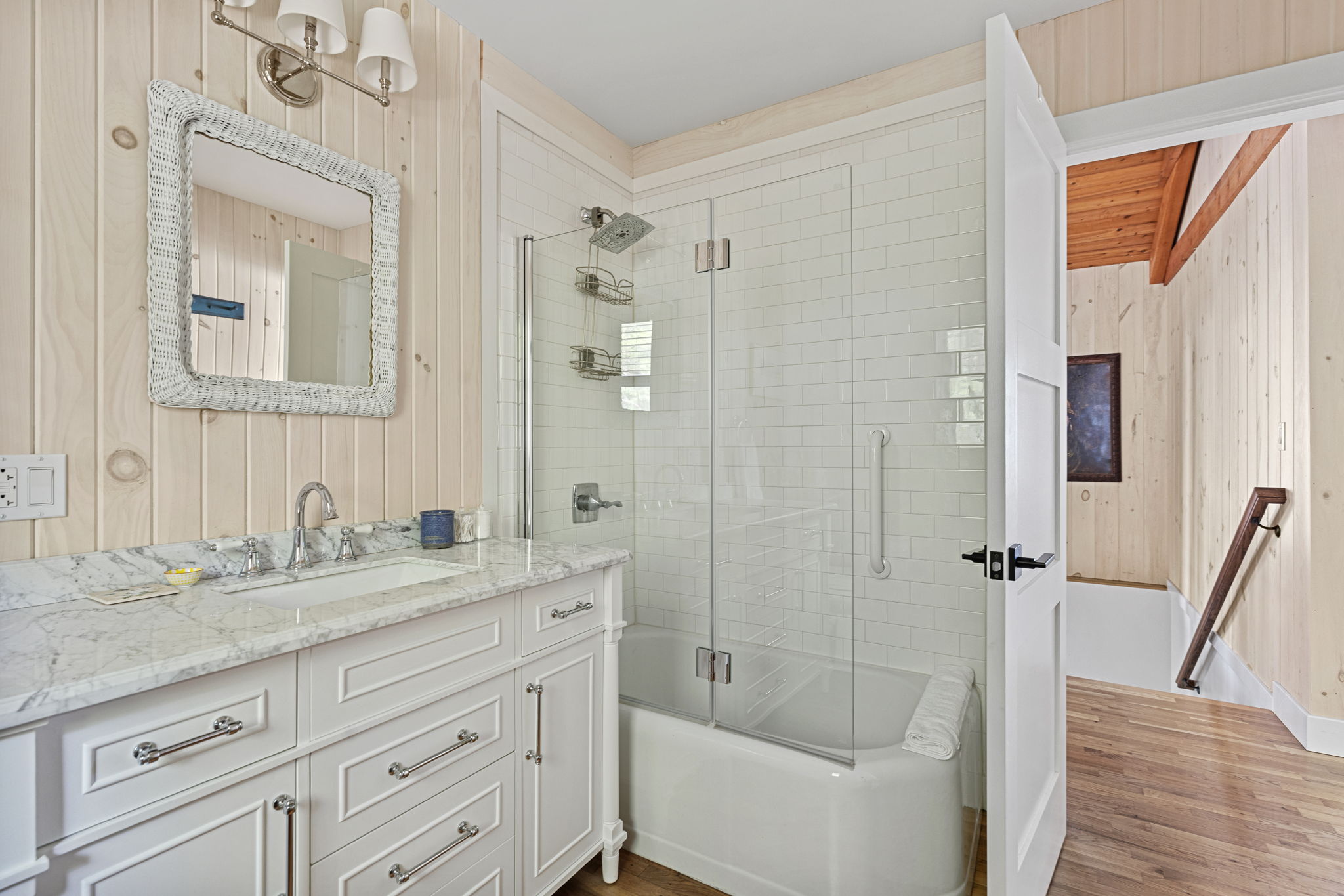 Marble-top deluxe vanity. Tiled shower-soaker tub with Rain-Shower head. Mm-mm.