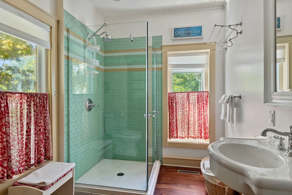 Minty fresh bathroom with a splash of vintage flair!