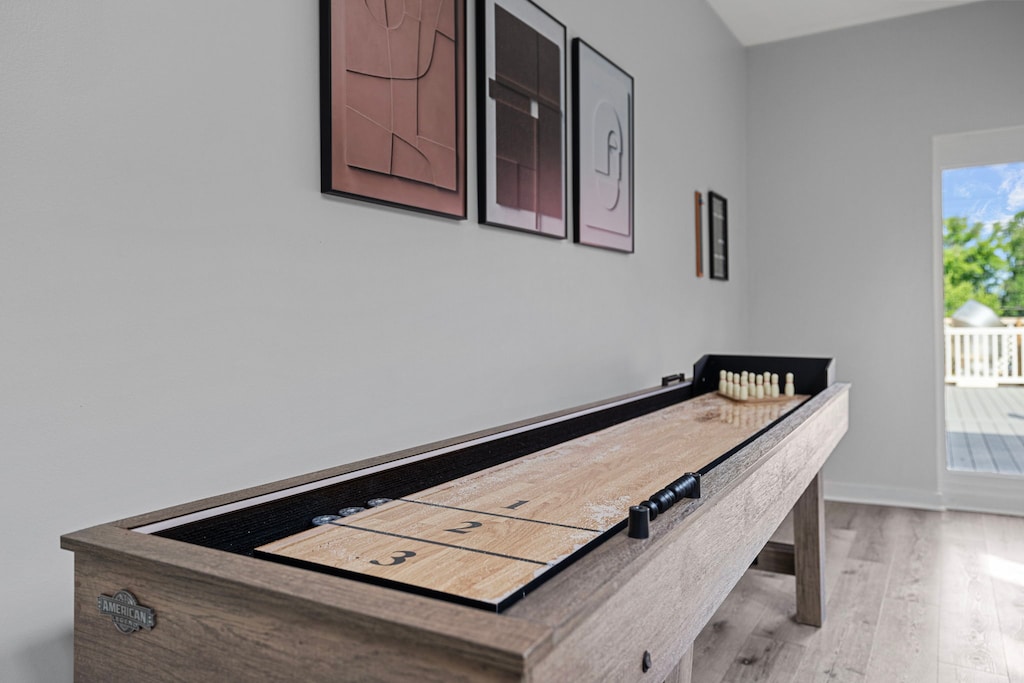 Game on! Who's ready to show off their shuffleboard skills? This setup is perfect for some friendly competition and endless fun. Let the games begin!