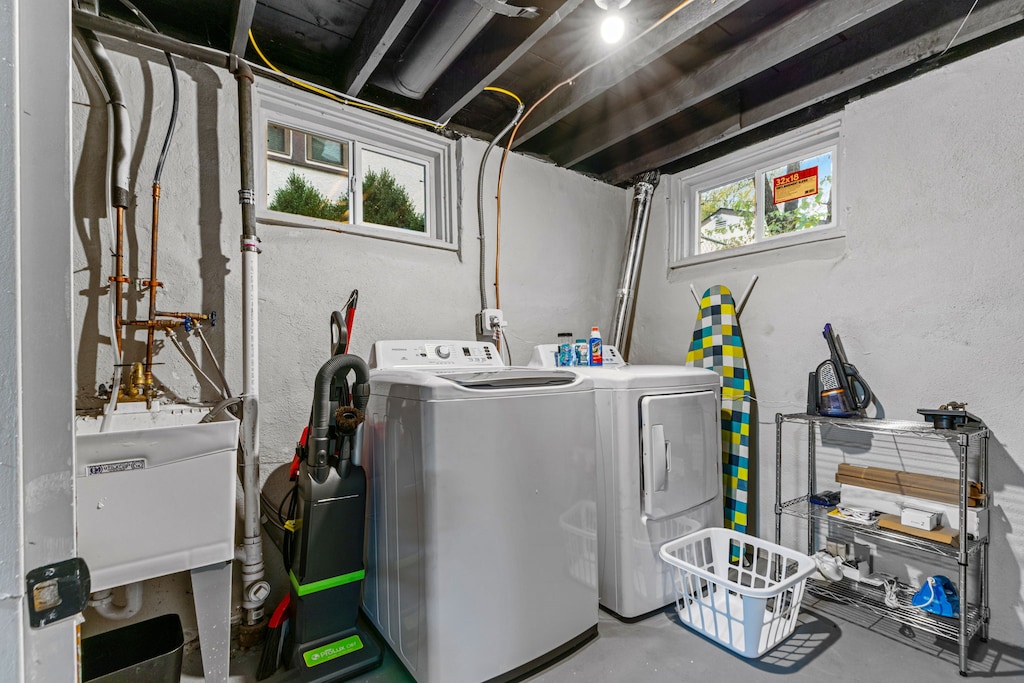 Your laundry needs are covered with full-sized washer and dryer in this convenient utility space.