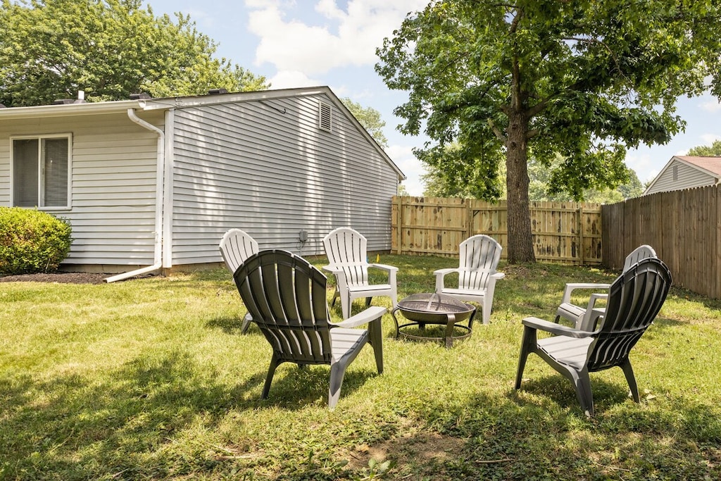 Take a moment to unwind by the fire pit and find a comfortable seat in our refreshing backyard. Enjoy the cozy atmosphere and make the most of your time in our outdoor space.