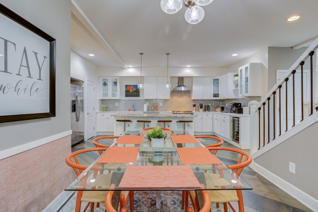 This cute dining area, featuring a four-seater dining table, is truly impressive and exceptional. The charm of the setup invites you to enjoy delightful meals in a cozy and stylish atmosphere.