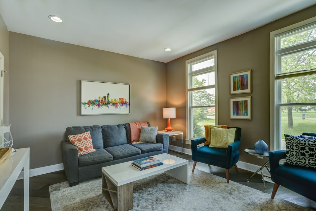 Relax and smile in this inviting hangout area with soft, beautiful sofas and couches—a perfect spot to read books and unwind.