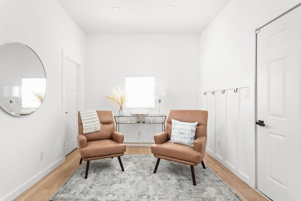 Charming Seating Nook: Bright space with stylish chairs and natural light for relaxation and chats!
