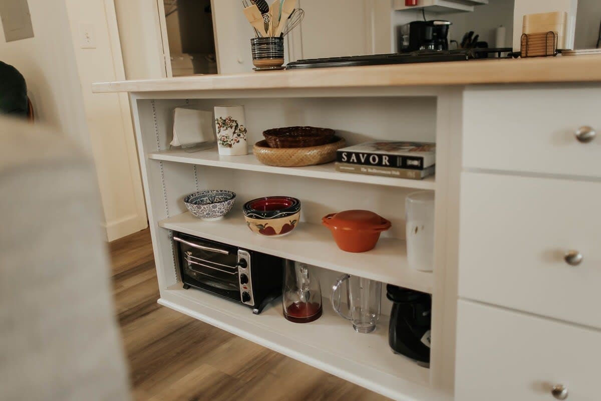 We've maximized the space under the countertops for convenient kitchen storage.