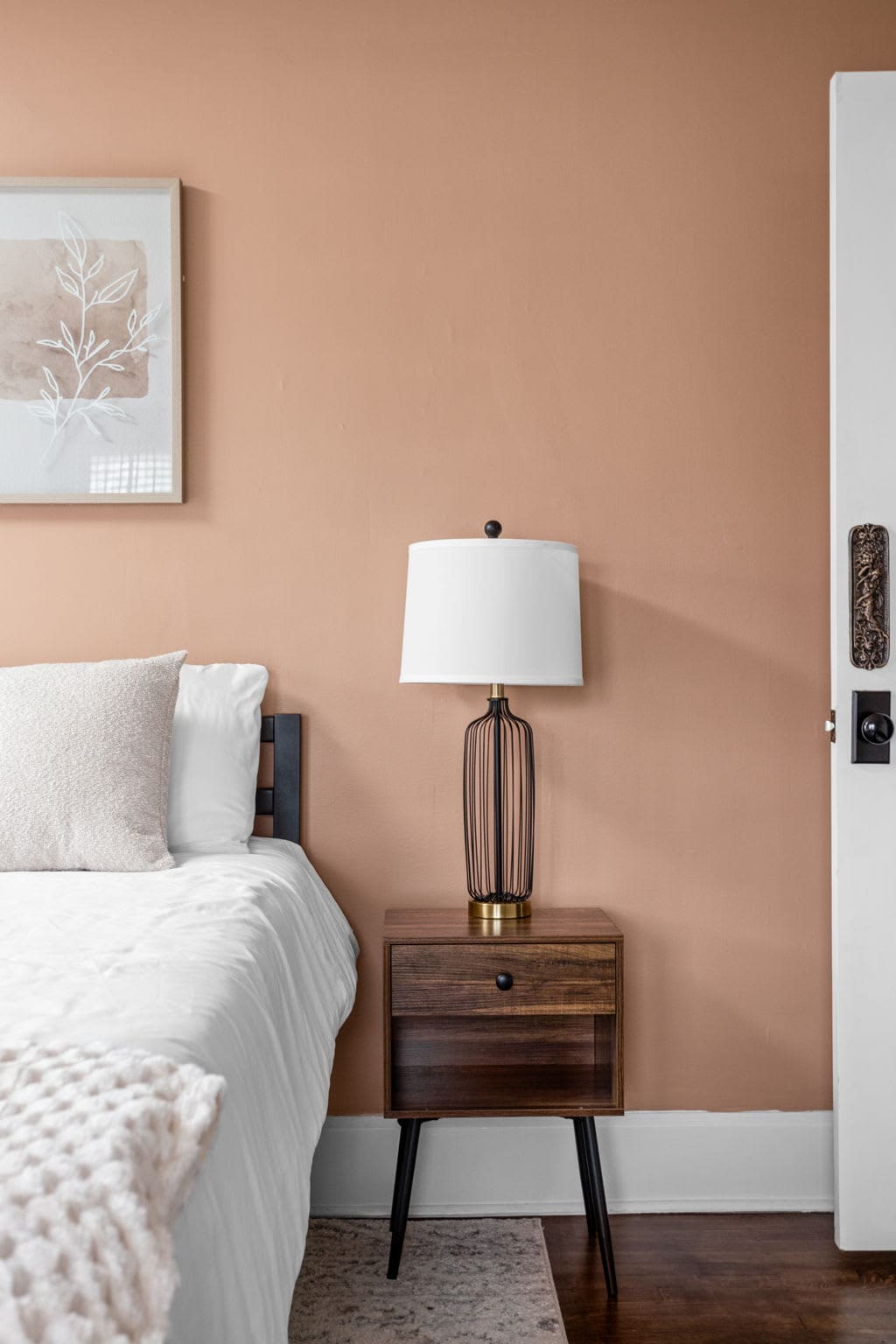Terracotta Room: Embrace tranquility with stylish decor, inviting lighting, and plush bedding!