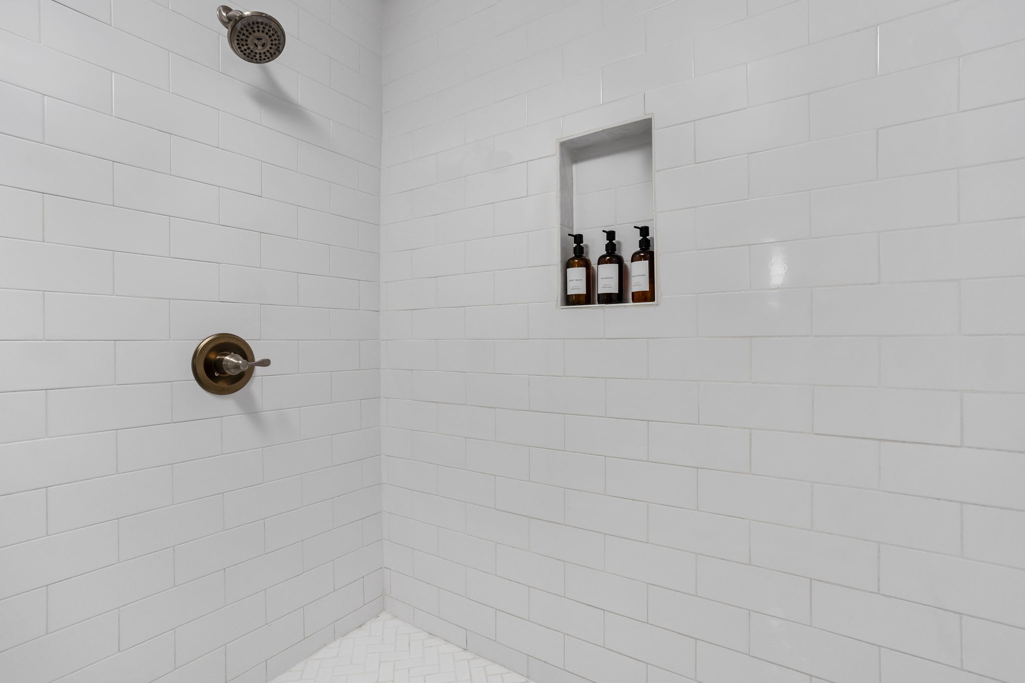 Primary Ensuite: Refresh in our sleek, modern shower with premium products at your fingertips! Primary Ensuite: Refresh in our sleek, modern shower with premium products at your fingertips!