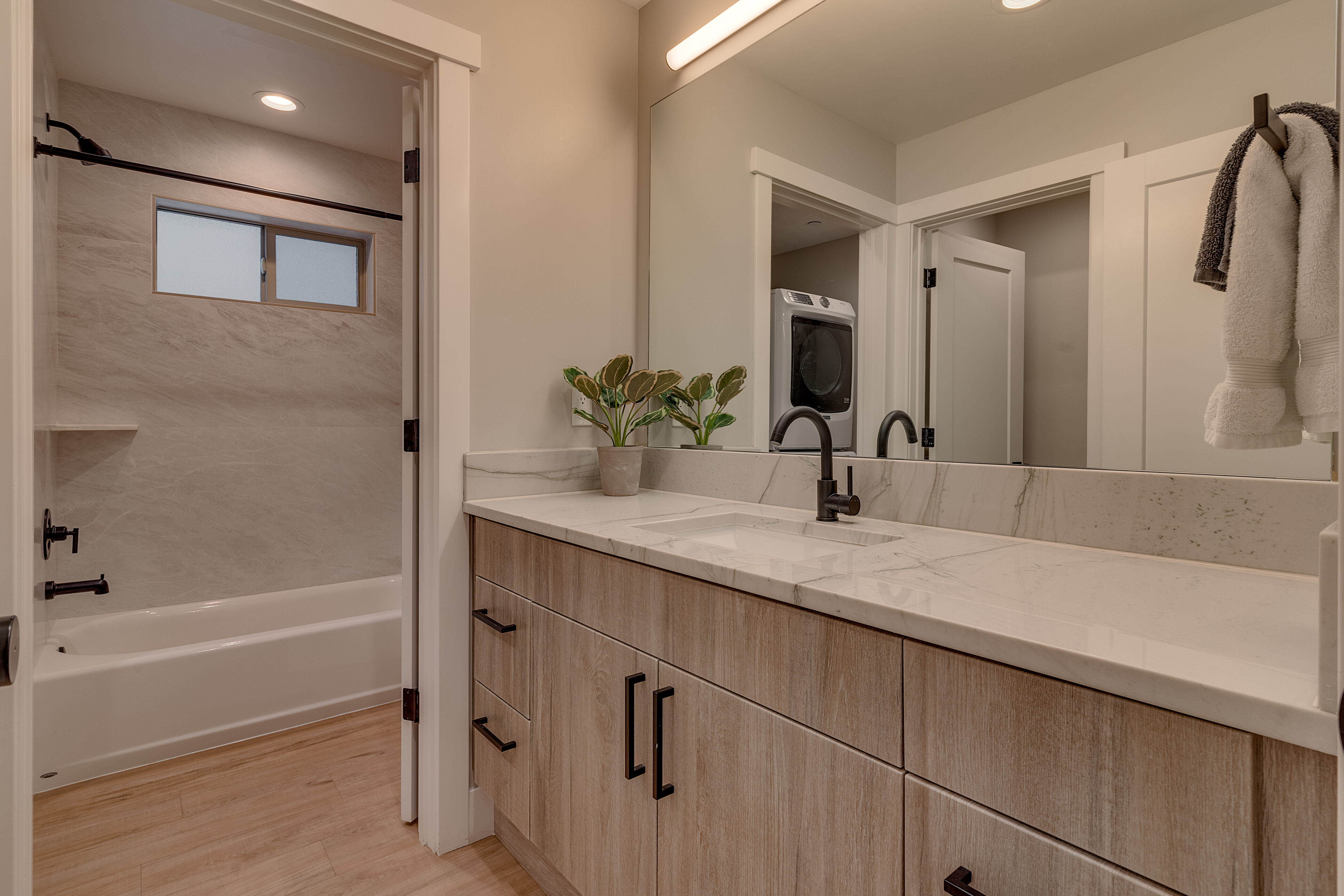 Bathroom with bath and shower combo