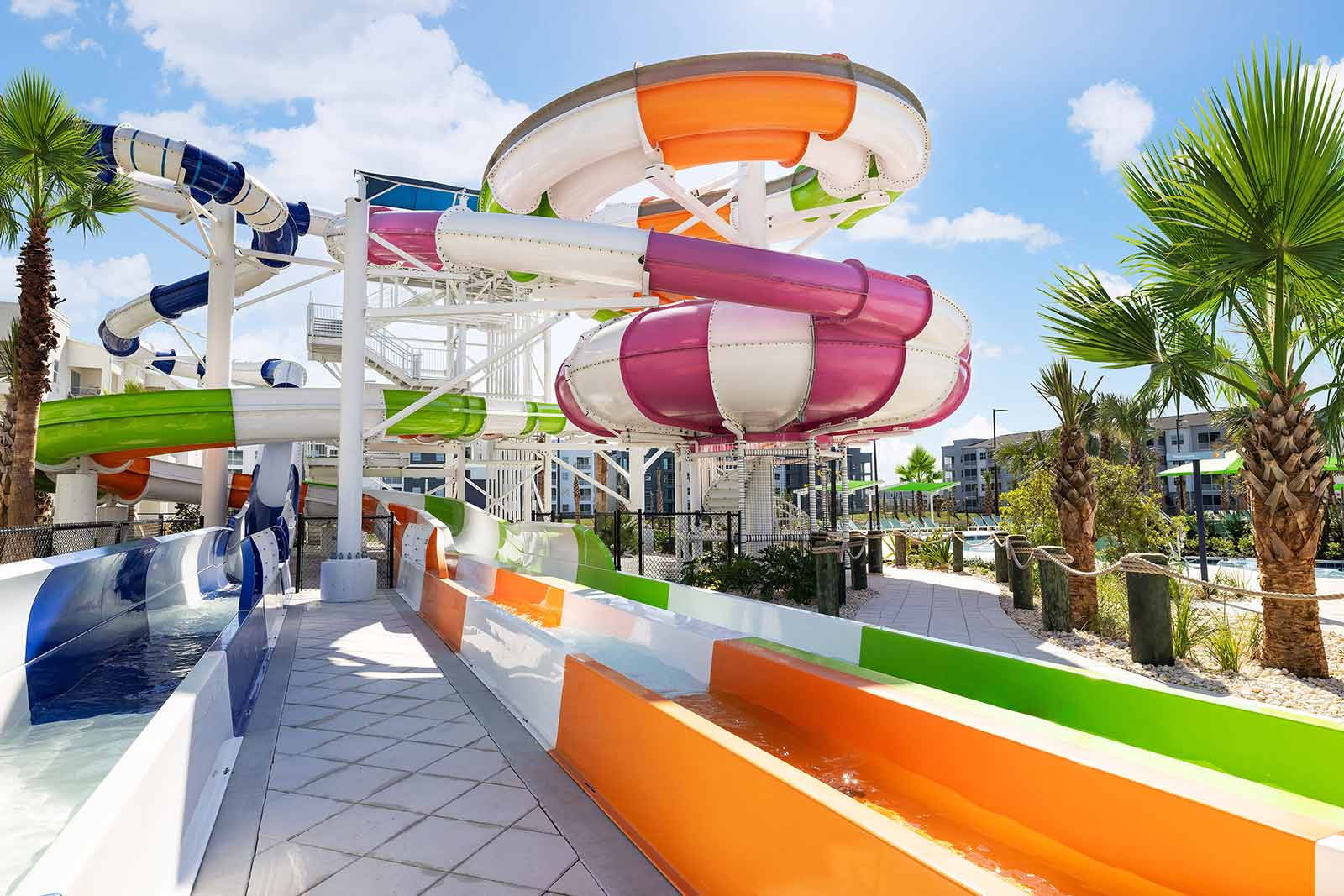 Race down the Blue Blaster, Violet Vortex, Emerald Rush and Coral Crush water slides, only at Aqua Bay