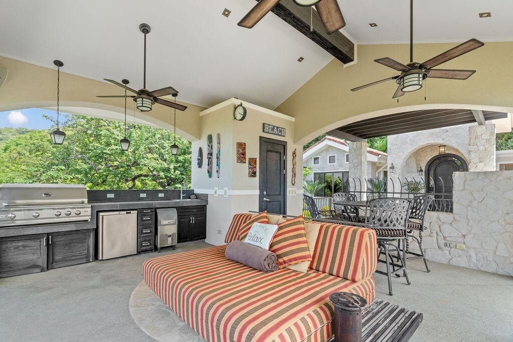 Outdoor Kitchen with BBQ Grill and Seating Area